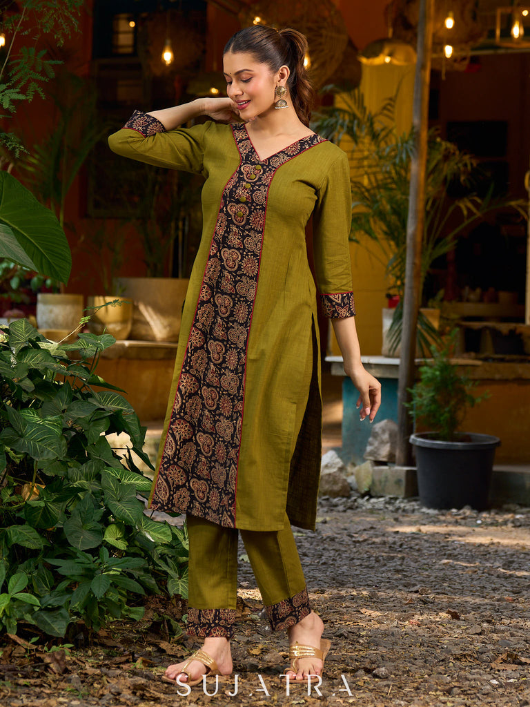 Olive kurta elevated with a black Ajrakh centre panel and Maroon details