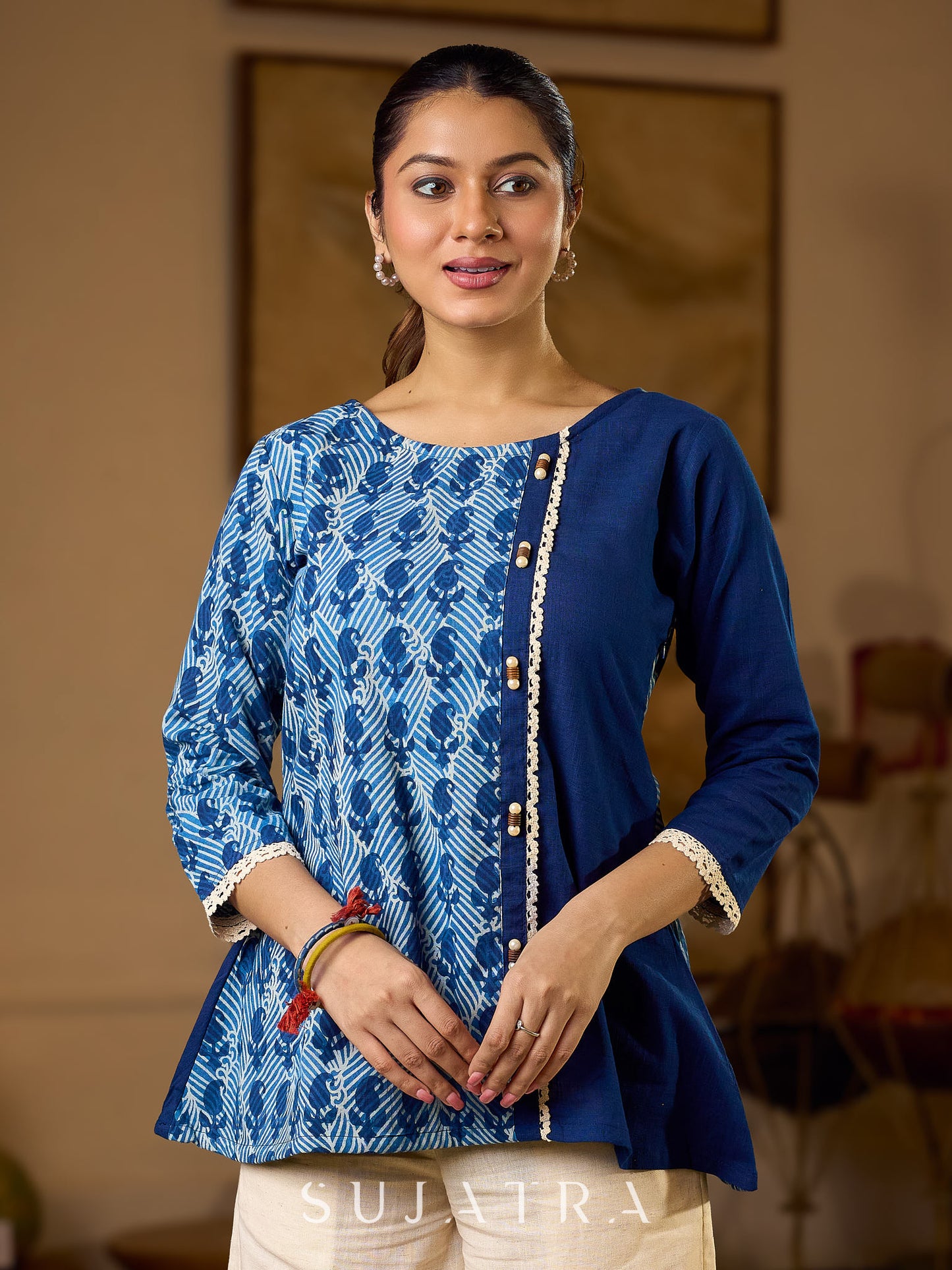 Indigo Paisley Printed Top Finished With Navy Blue Accents And A Refined Pearl Button Detail
