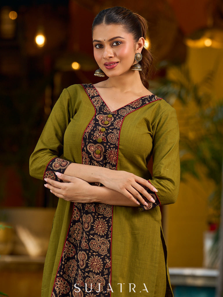 Olive kurta elevated with a black Ajrakh centre panel and Maroon details