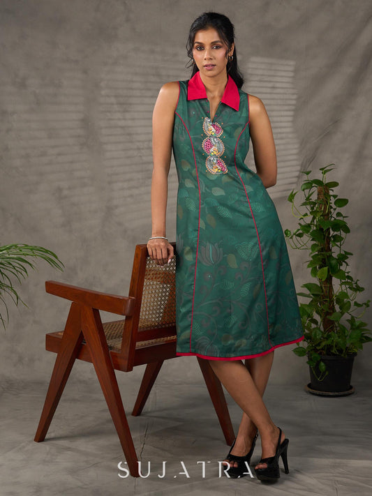 Bottle green Madhubani printed dress with vibrant magenta accents.