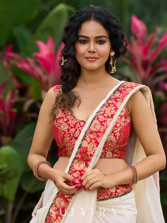 Ivory elegance with royal red Banarasi border, timeless festive glamour