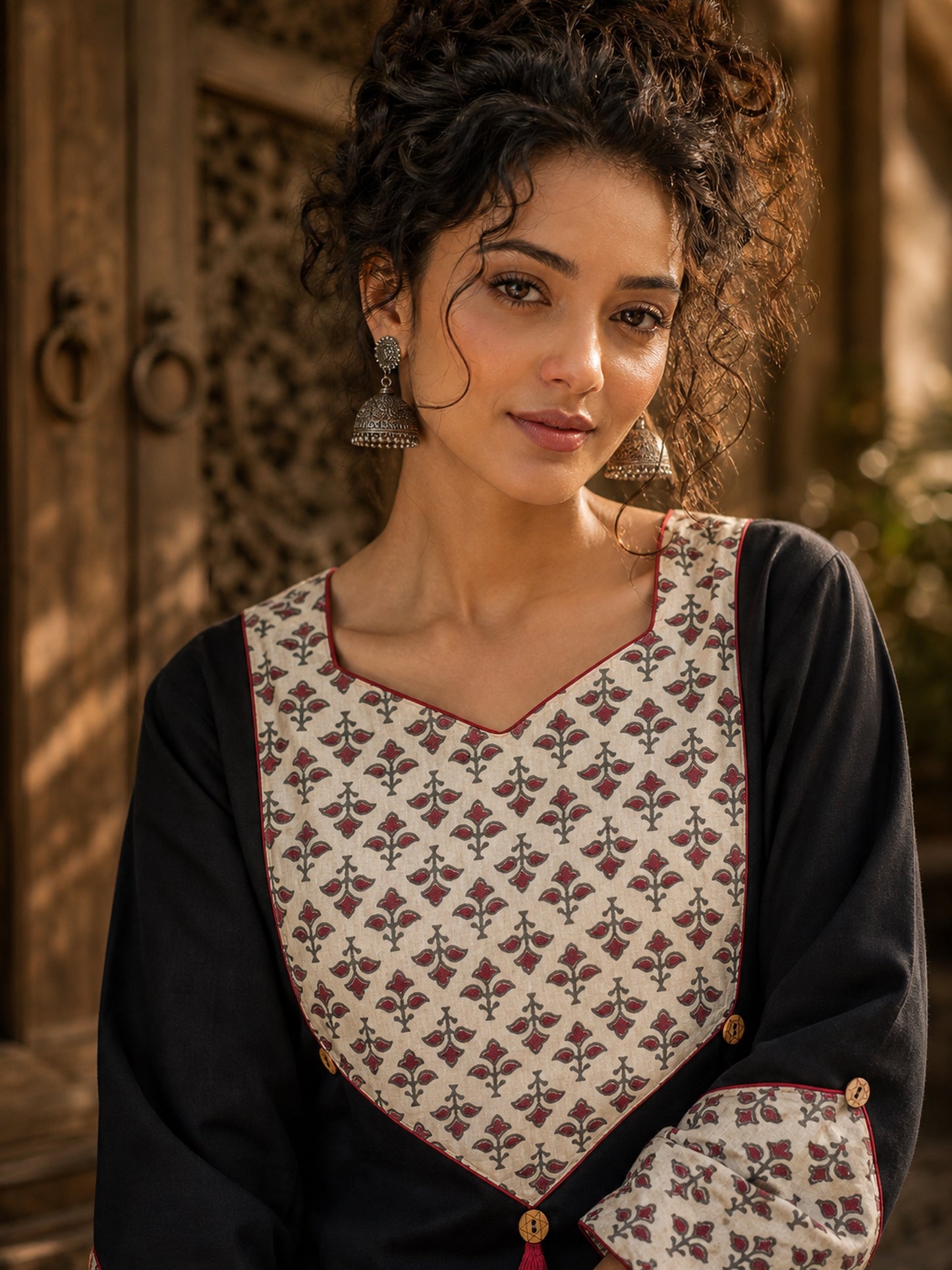 Black Cotton Kurta with Ajrakh Printed Yoke & Matching Cuffs with Minimal Embellishment