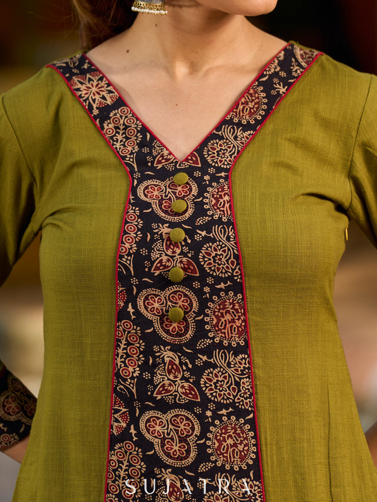 Olive kurta elevated with a black Ajrakh centre panel and Maroon details