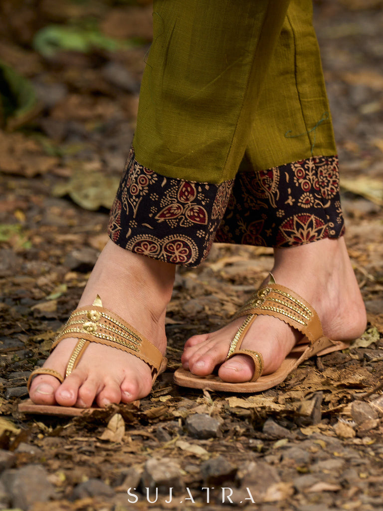 Olive kurta elevated with a black Ajrakh centre panel and Maroon details