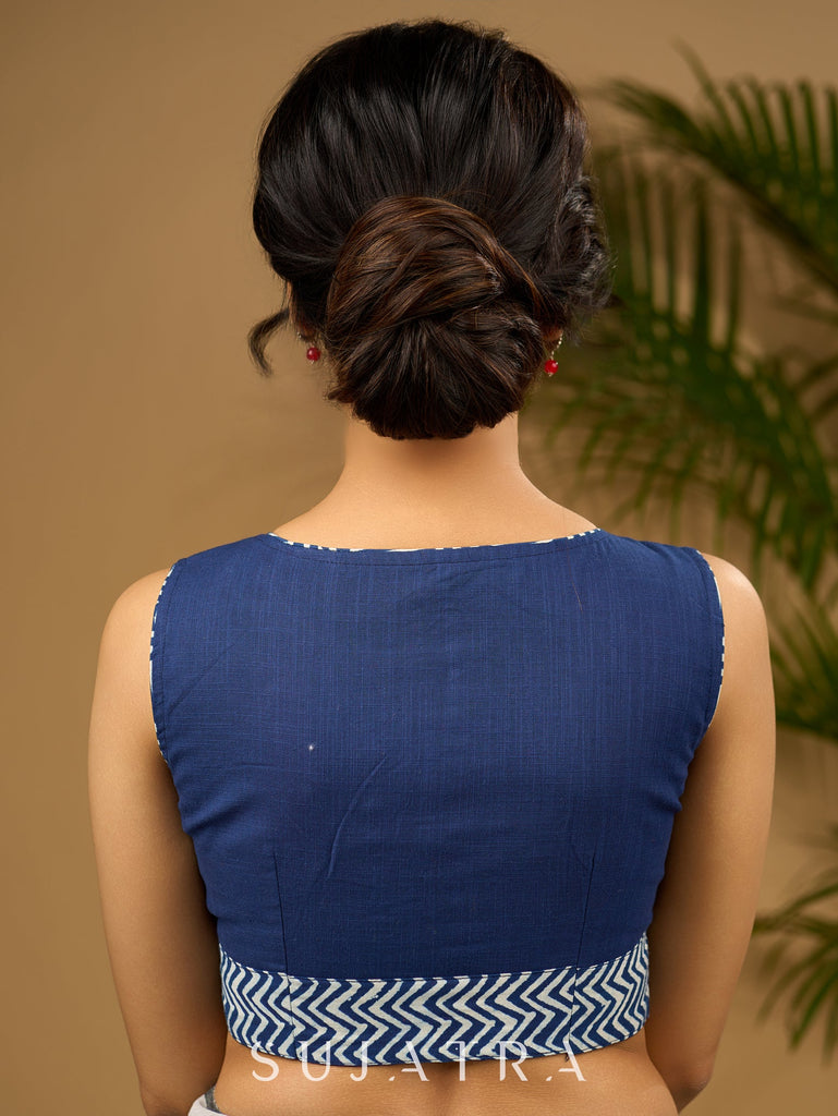 Unique indigo patchwork cotton sleeveless blouse.