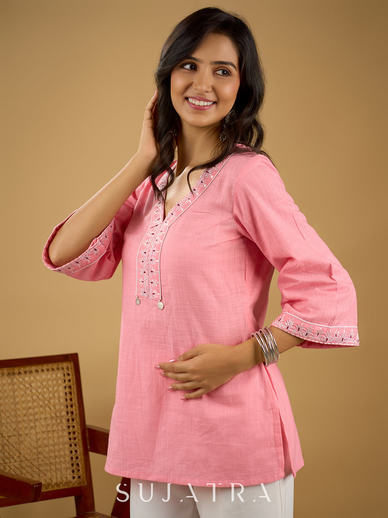 Elegant baby pink cotton top highlighted with subtle thread embroidery