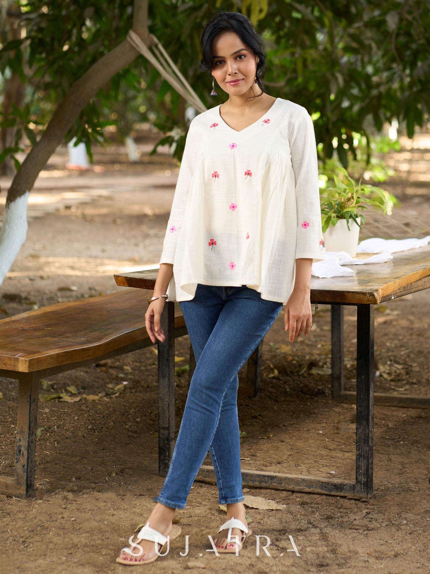 Blissful White Cotton Top with Intricate Hand Embroidery, V Neckline & Side Gathers