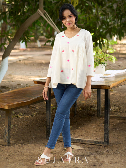 Blissful White Cotton Top with Intricate Hand Embroidery, V Neckline & Side Gathers