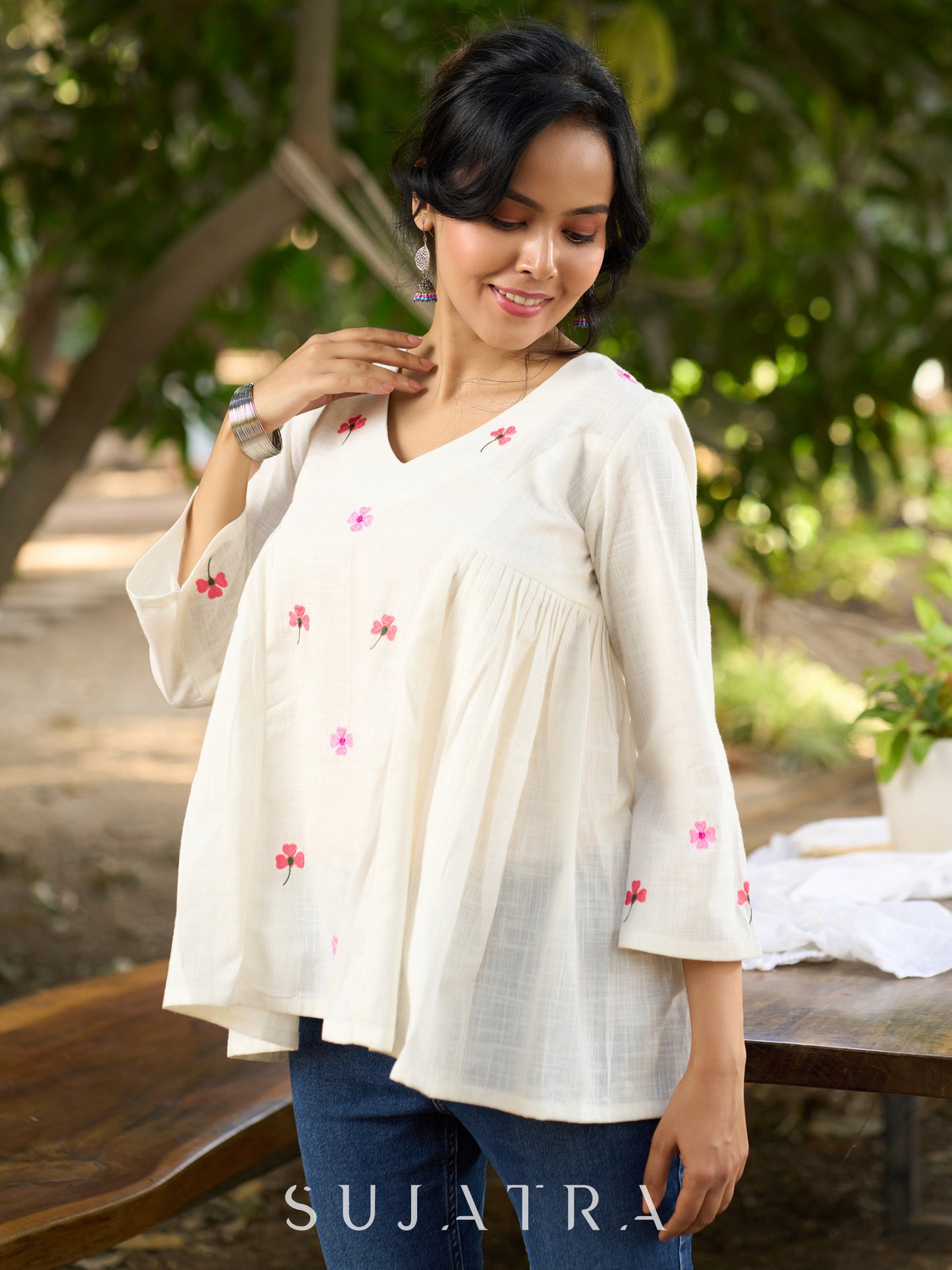 Blissful White Cotton Top with Intricate Hand Embroidery, V Neckline & Side Gathers