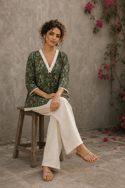 Earthy deep olive Jaipur floral top featuring box-pleated sleeves and delicate Hakoba accents for timeless elegance.