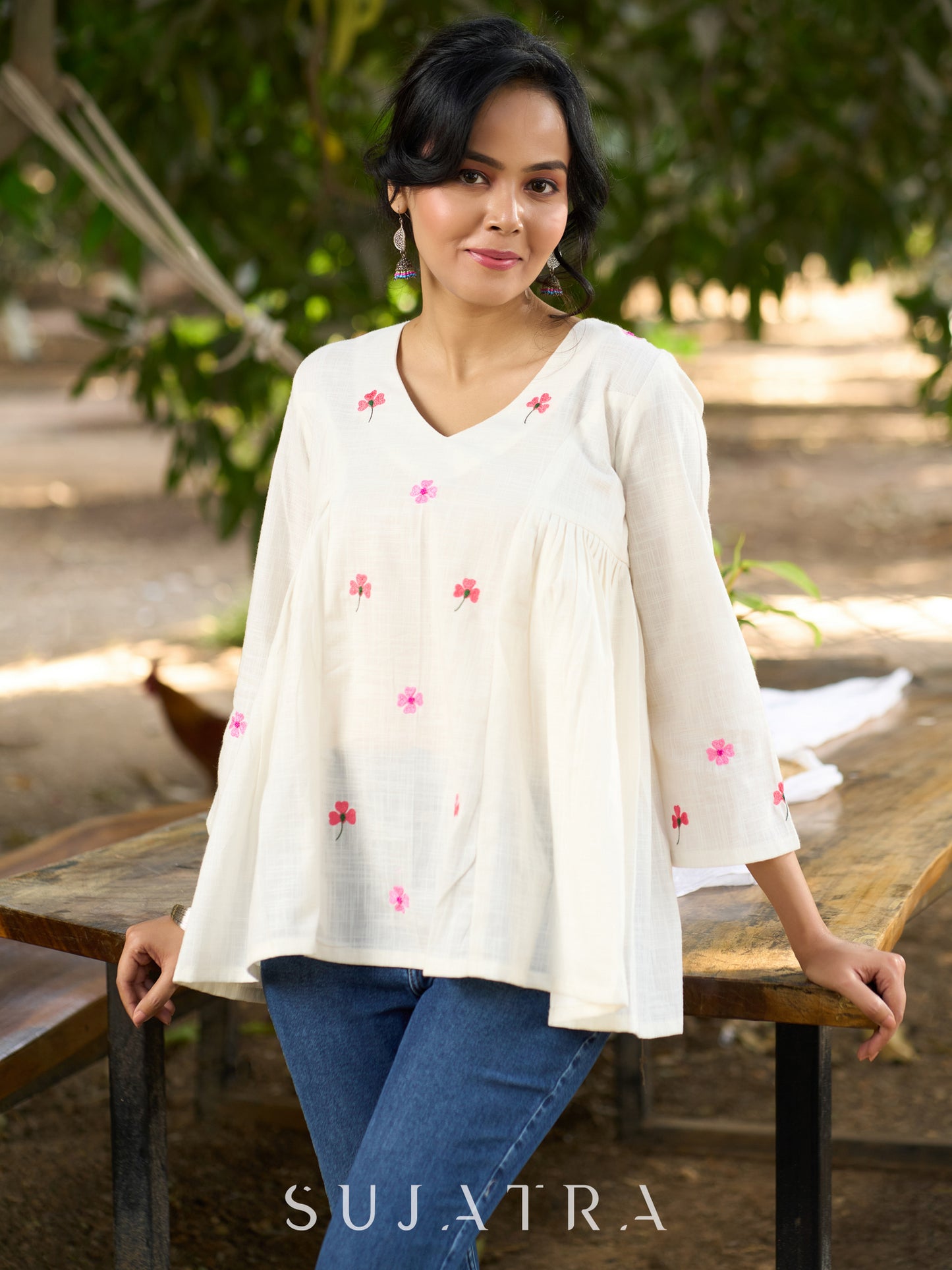 Blissful White Cotton Top with Intricate Hand Embroidery, V Neckline & Side Gathers