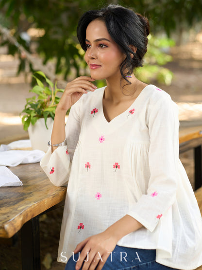 Blissful White Cotton Top with Intricate Hand Embroidery, V Neckline & Side Gathers