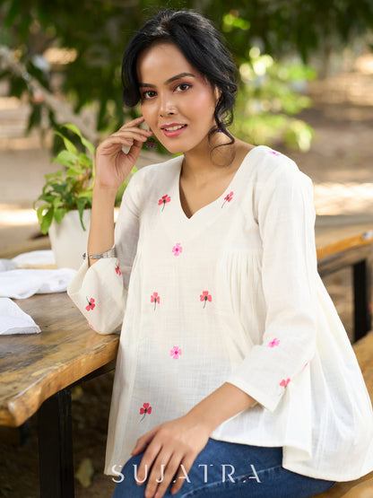 Blissful White Cotton Top with Intricate Hand Embroidery, V Neckline & Side Gathers