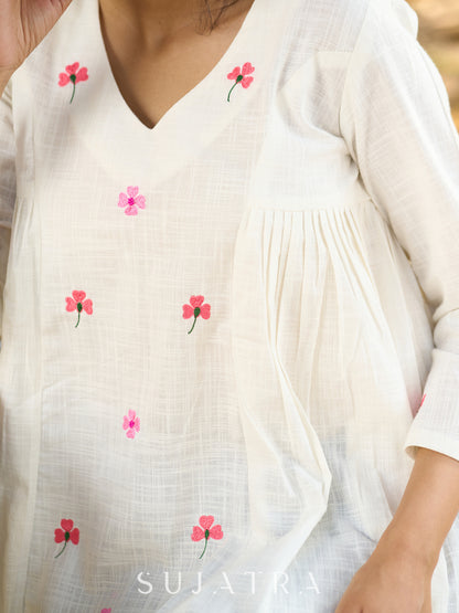 Blissful White Cotton Top with Intricate Hand Embroidery, V Neckline & Side Gathers