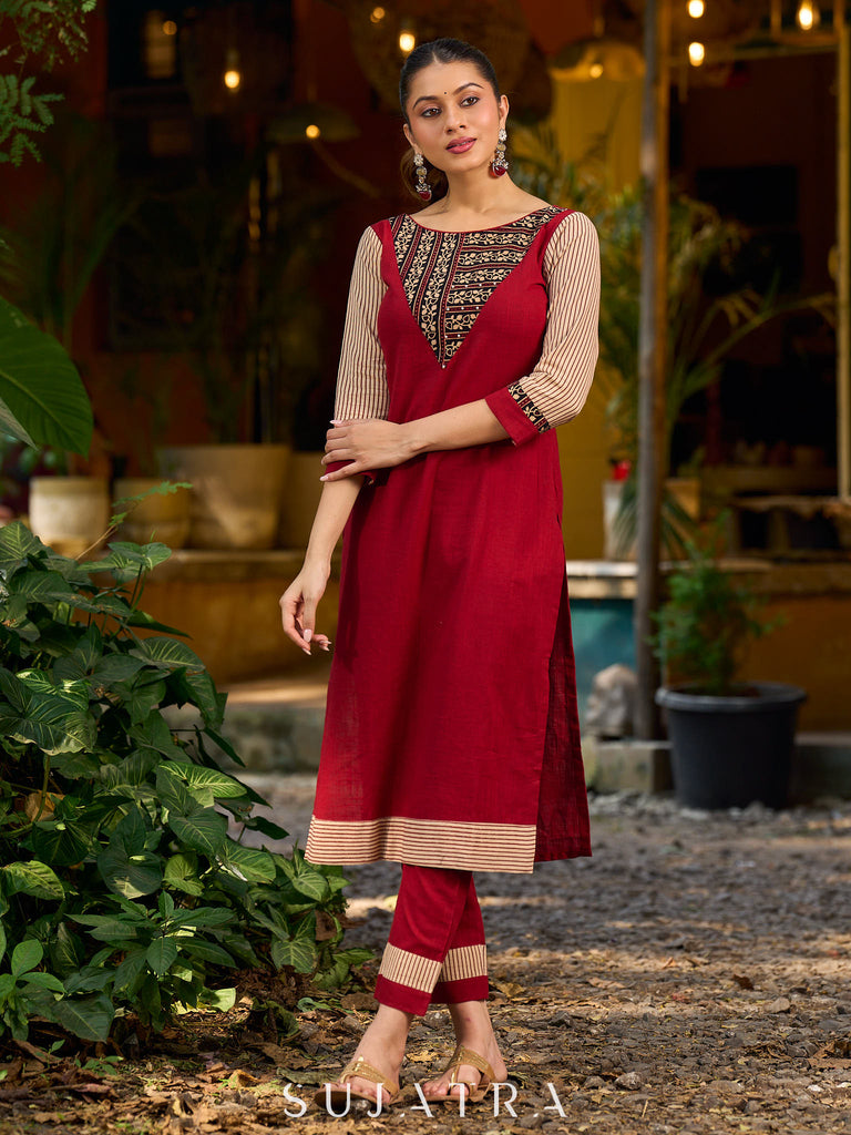 Handcrafted maroon kurta with a V-neck Ajrakh panel and stylish striped sleeves.