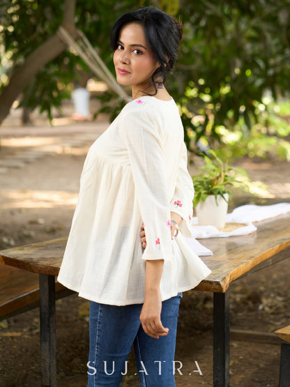 Blissful White Cotton Top with Intricate Hand Embroidery, V Neckline & Side Gathers