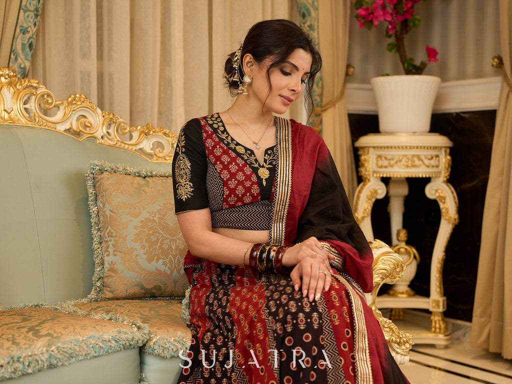 Handcrafted maroon & black Ajrakh print lehenga paired with an embroidered blouse for rich artisanal look - Dupatta Optional