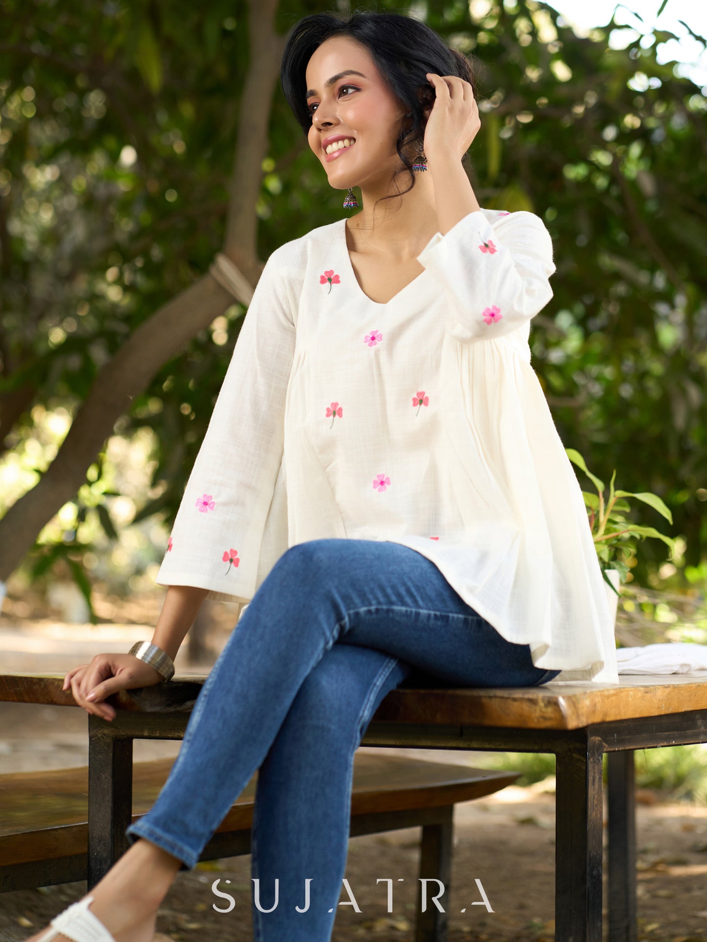 Blissful White Cotton Top with Intricate Hand Embroidery, V Neckline & Side Gathers