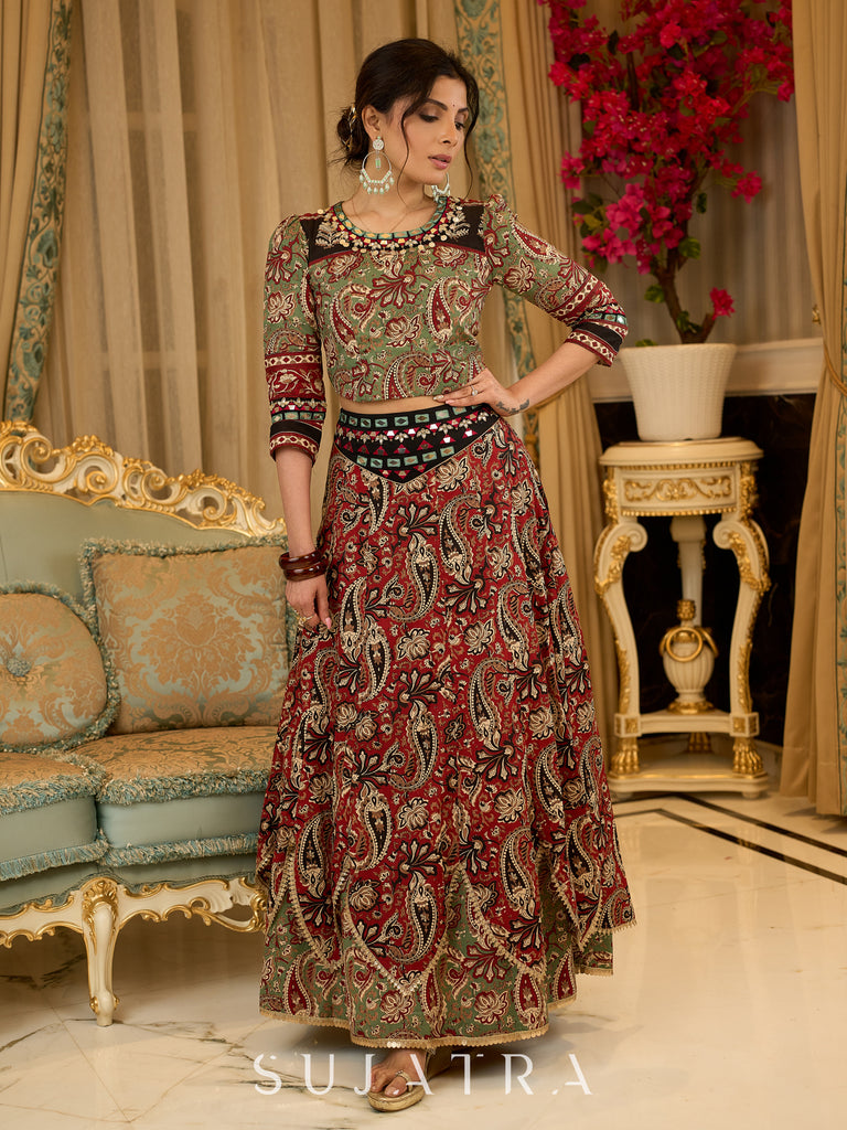 Contemporary folkloric ensemble featuring a petal cut block printed lehenga with mirror work accents  - Embroidered Dupatta Optional