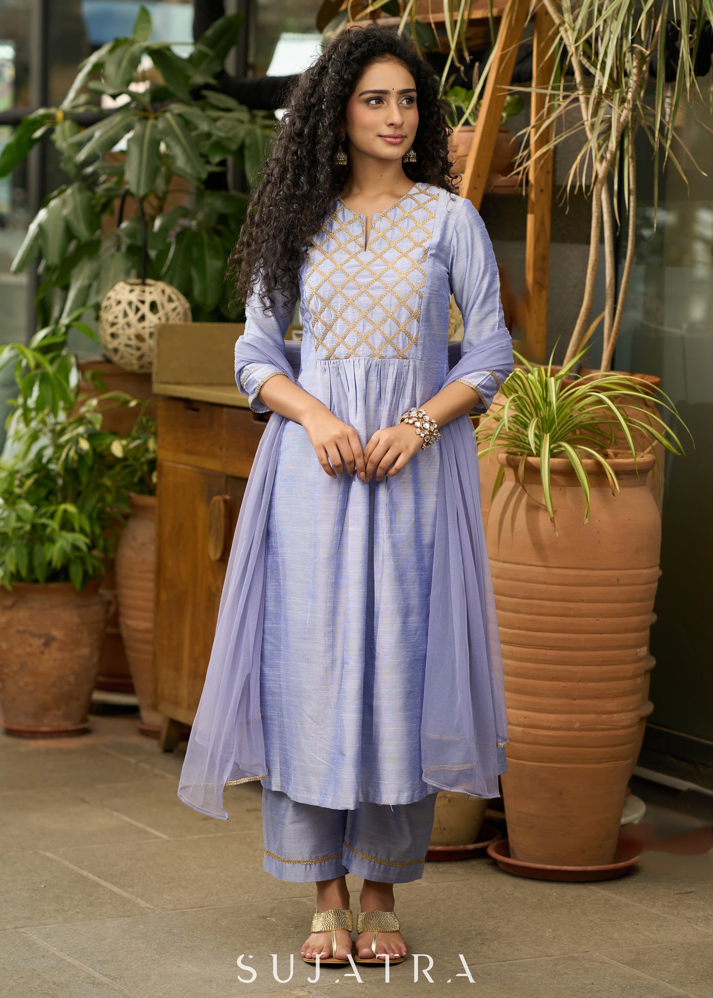 Light blue cotton silk  Kurtawith stylish criss cross yoke