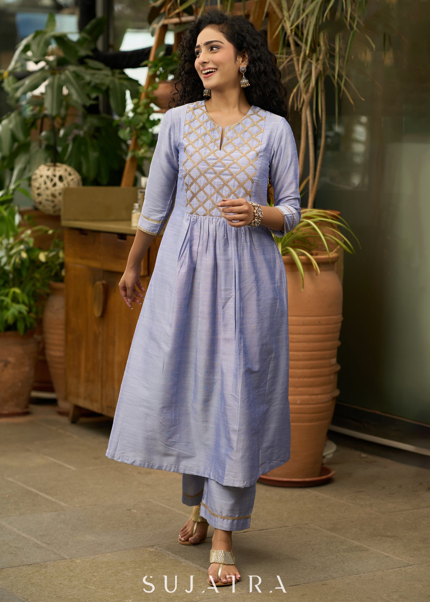 Light blue cotton silk  Kurtawith stylish criss cross yoke