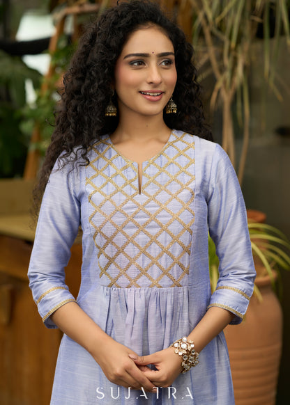 Light blue cotton silk  Kurtawith stylish criss cross yoke