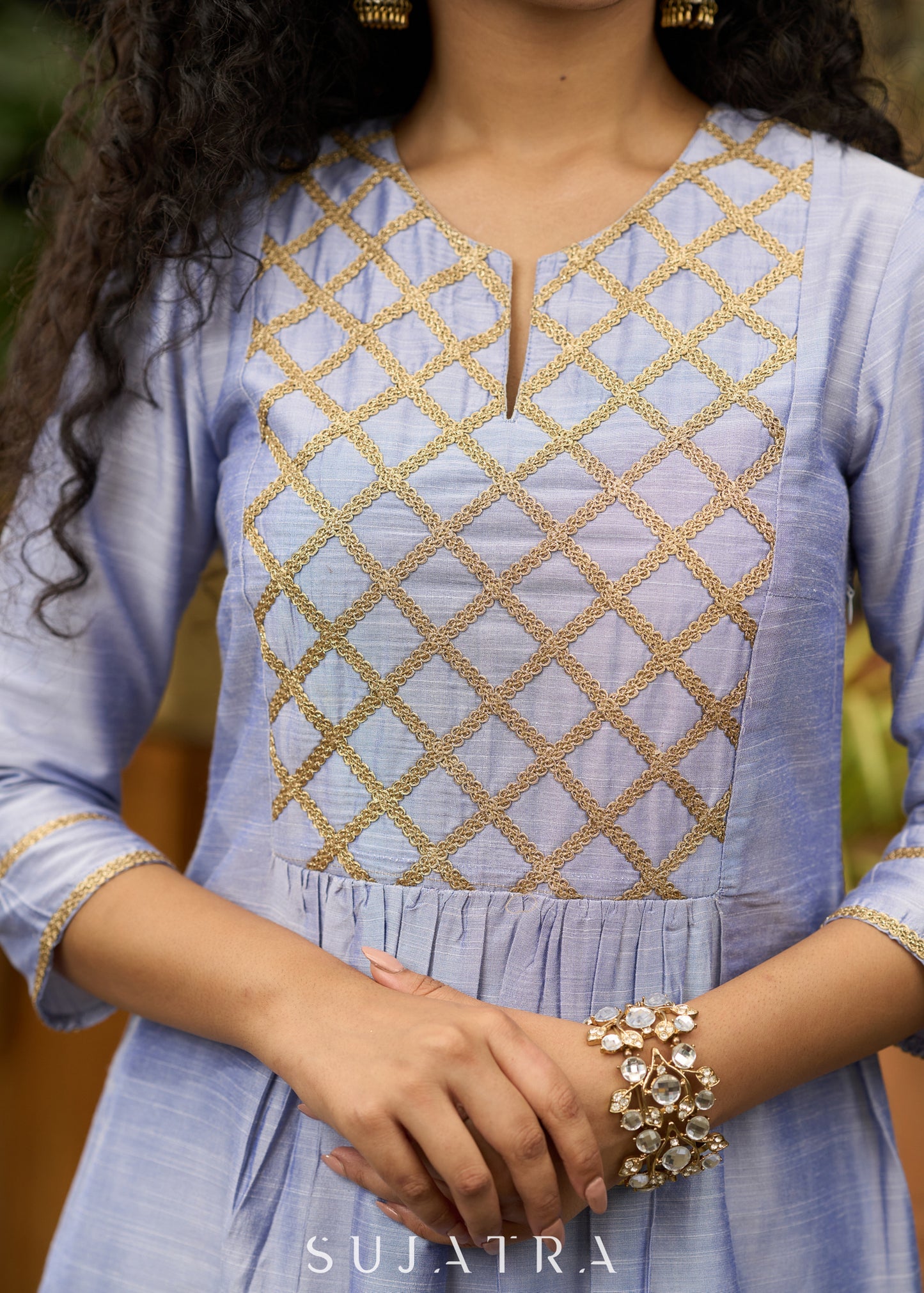 Light blue cotton silk  Kurtawith stylish criss cross yoke