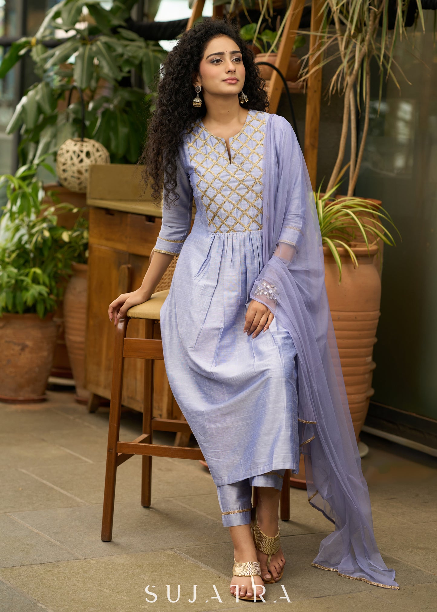 Light blue cotton silk  Kurtawith stylish criss cross yoke