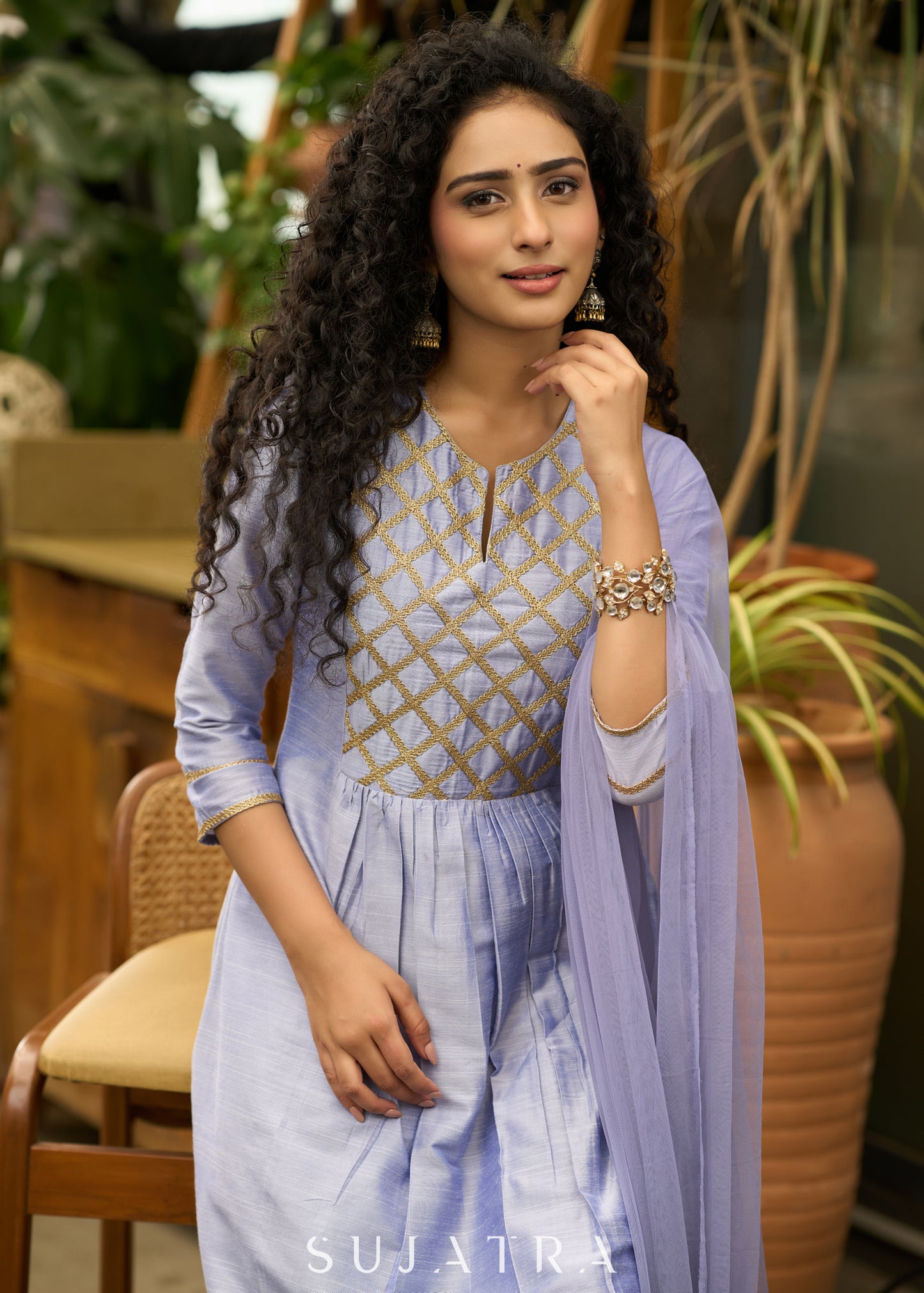 Light blue cotton silk  Kurtawith stylish criss cross yoke