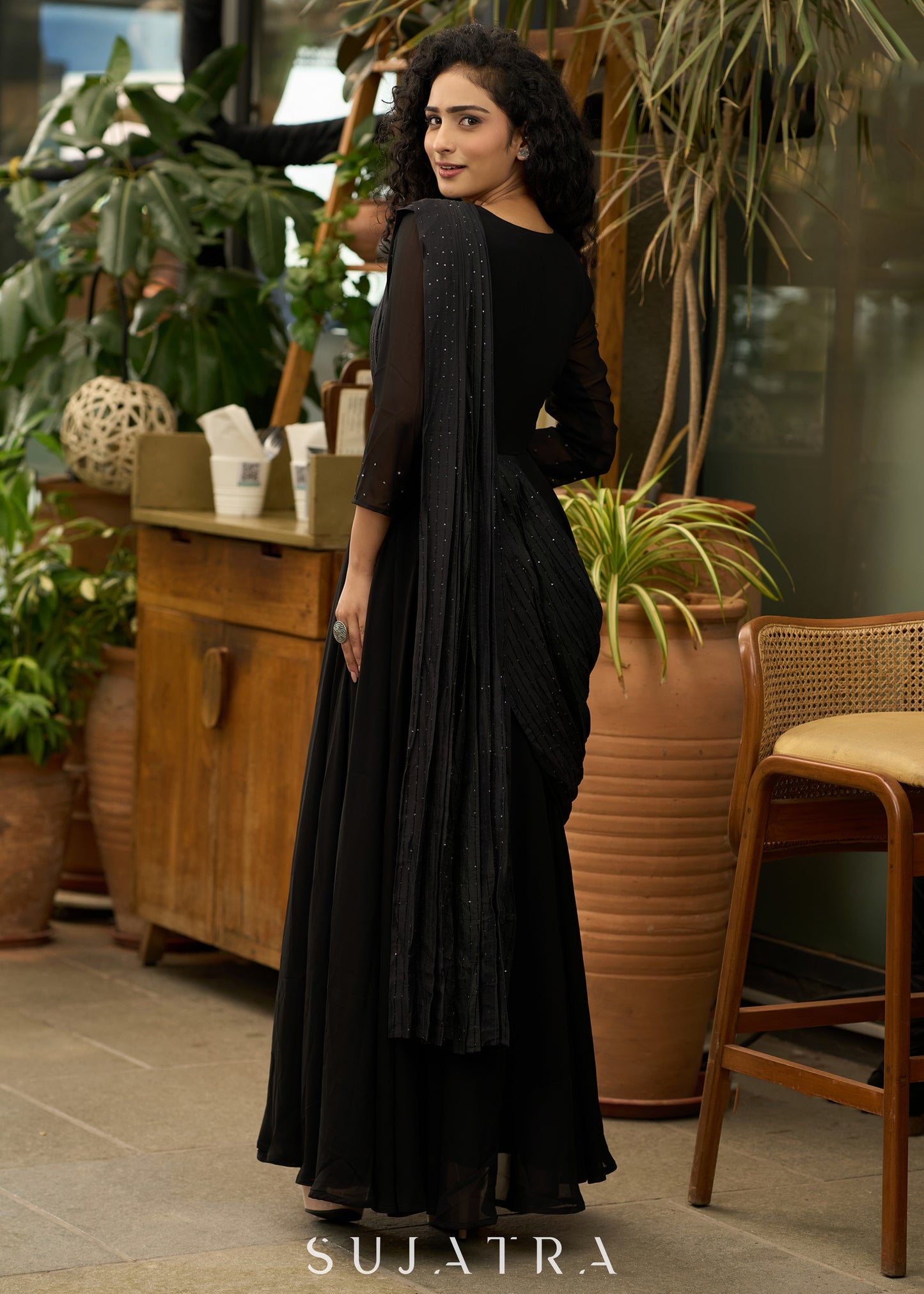 Trendy black georgette saree gown with self embroidered pallu - Brooch optional