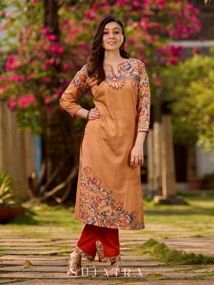 Elegant mustard kurta featuring Kalamkari print in an asymmetrical layout