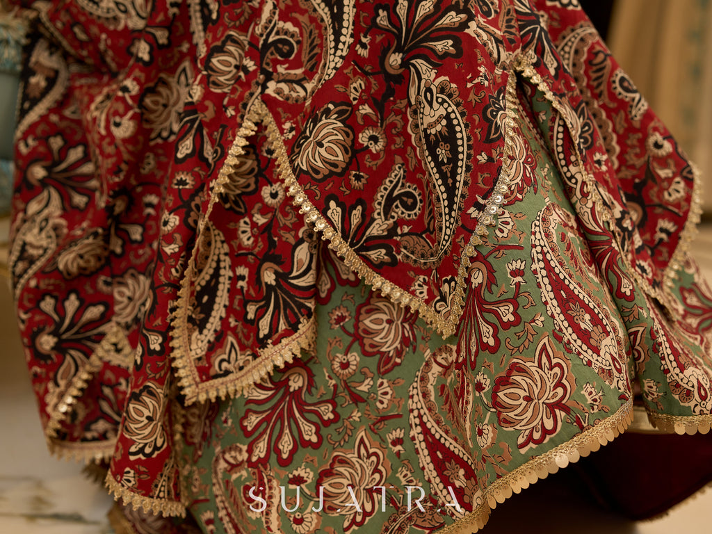 Contemporary folkloric ensemble featuring a petal cut block printed lehenga with mirror work accents  - Embroidered Dupatta Optional