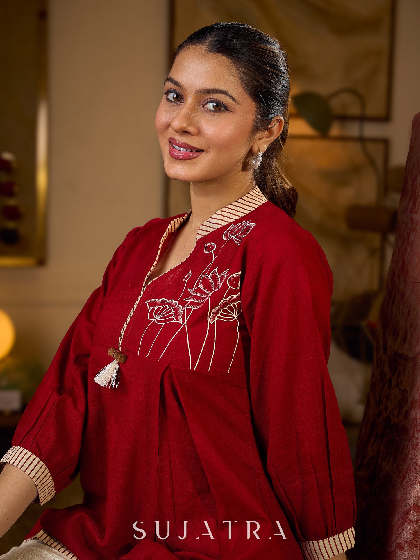 Maroon Cotton Pleated Top Featuring Ajrakh Striped Collar And Hem Accented With Pichwai Hand Painting