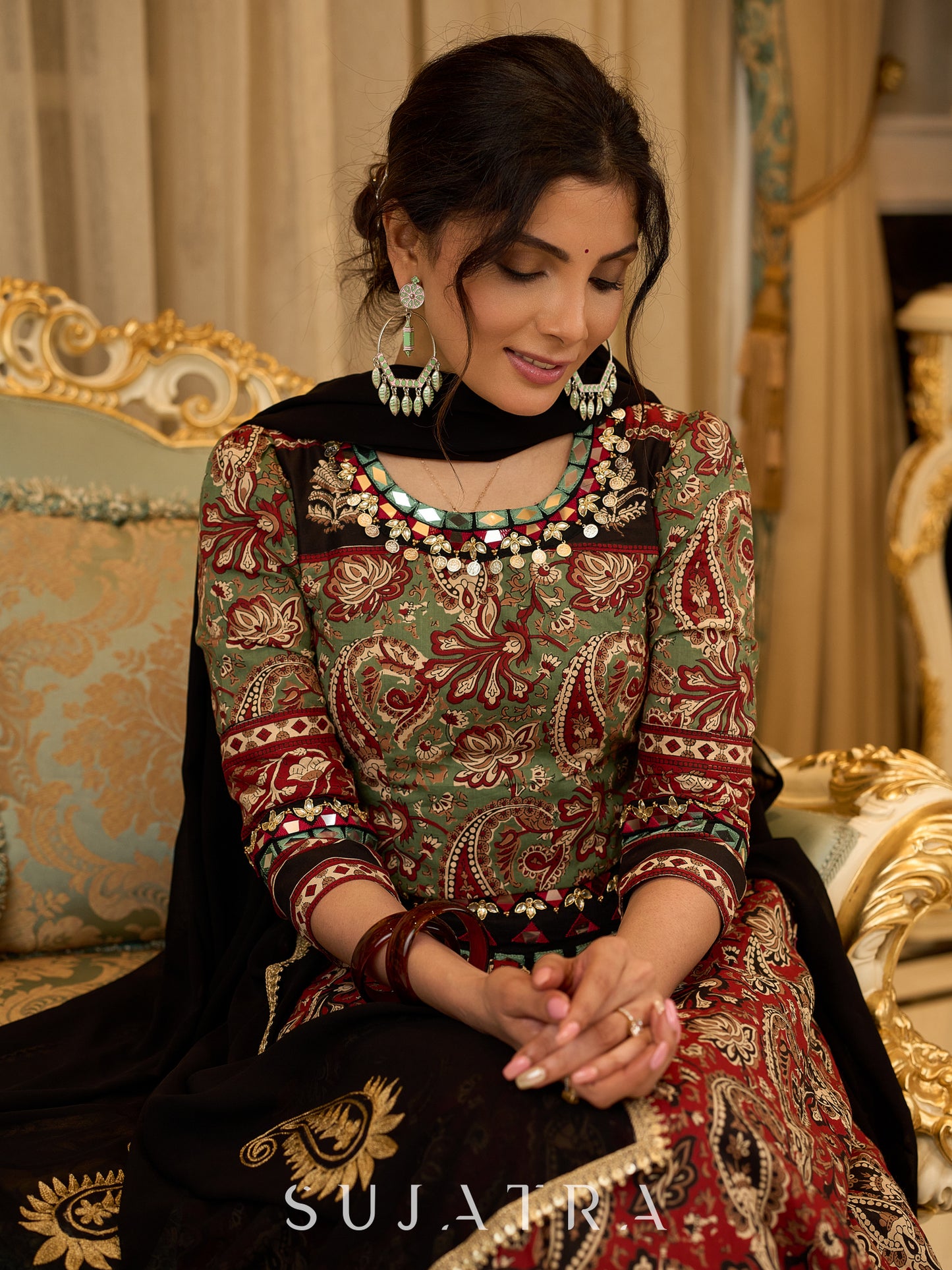 Contemporary folkloric ensemble featuring a petal cut block printed lehenga with mirror work accents  - Embroidered Dupatta Optional