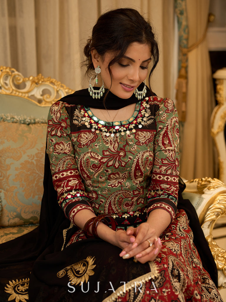 Contemporary folkloric ensemble featuring a petal cut block printed lehenga with mirror work accents  - Embroidered Dupatta Optional