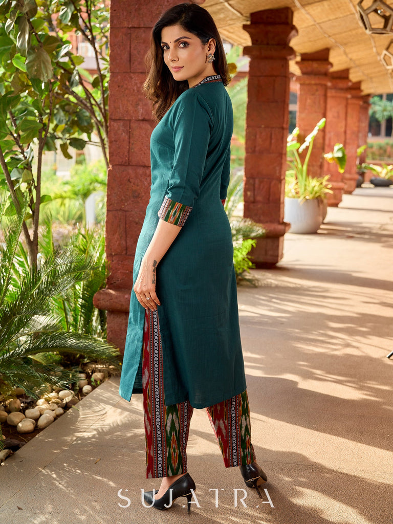 Dark green cotton kurta adorned with traditional Kutch mirror work-ikkat pant optional.