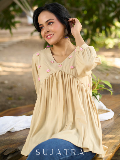 Blissful Beige Cotton Rayon Peplum Top with Ethereal Gathers & Exquisite Hand Embroidered Florals