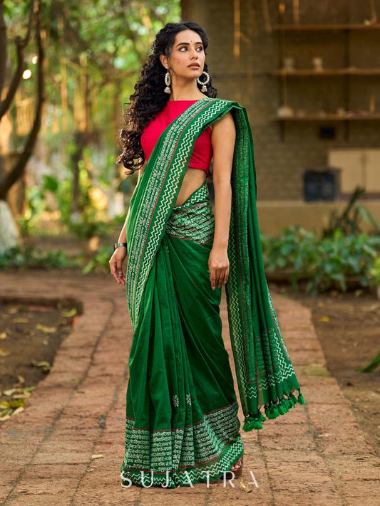 Refined Green Cotton Saree with Hand Block Printed Slogan Border & Contrasting Pink Accents