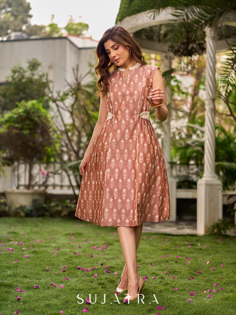 Chic champagne beige Ikat dress elevated with Hakoba accents, a relaxed drop-shoulder fit, mandarin neckline, and fluid side gathers detailed with Hakoba flaps.