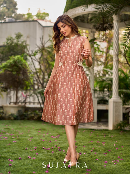 Chic champagne beige Ikat dress elevated with Hakoba accents, a relaxed drop-shoulder fit, mandarin neckline, and fluid side gathers detailed with Hakoba flaps.