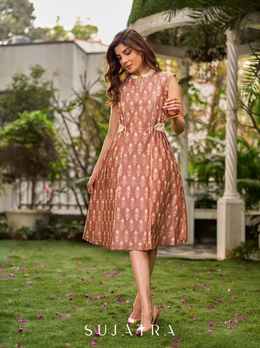 Chic champagne beige Ikat dress elevated with Hakoba accents, a relaxed drop-shoulder fit, mandarin neckline, and fluid side gathers detailed with Hakoba flaps.