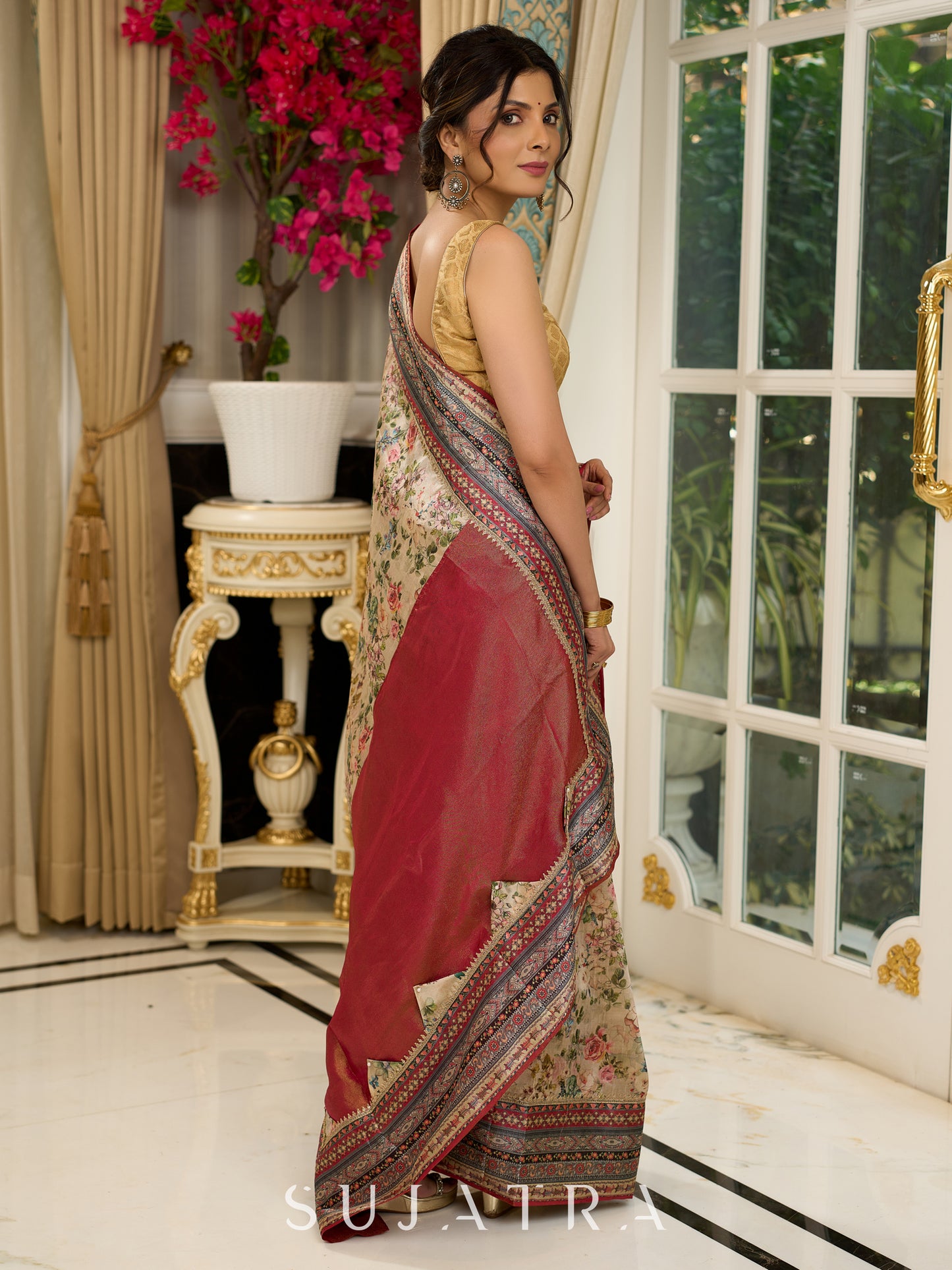 Graceful floral printed saree with intricate border, ideal for weddings and celebrations