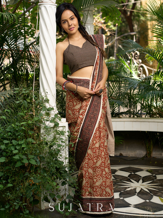 Earthy block-printed cotton saree with paisley charm and rustic elegance