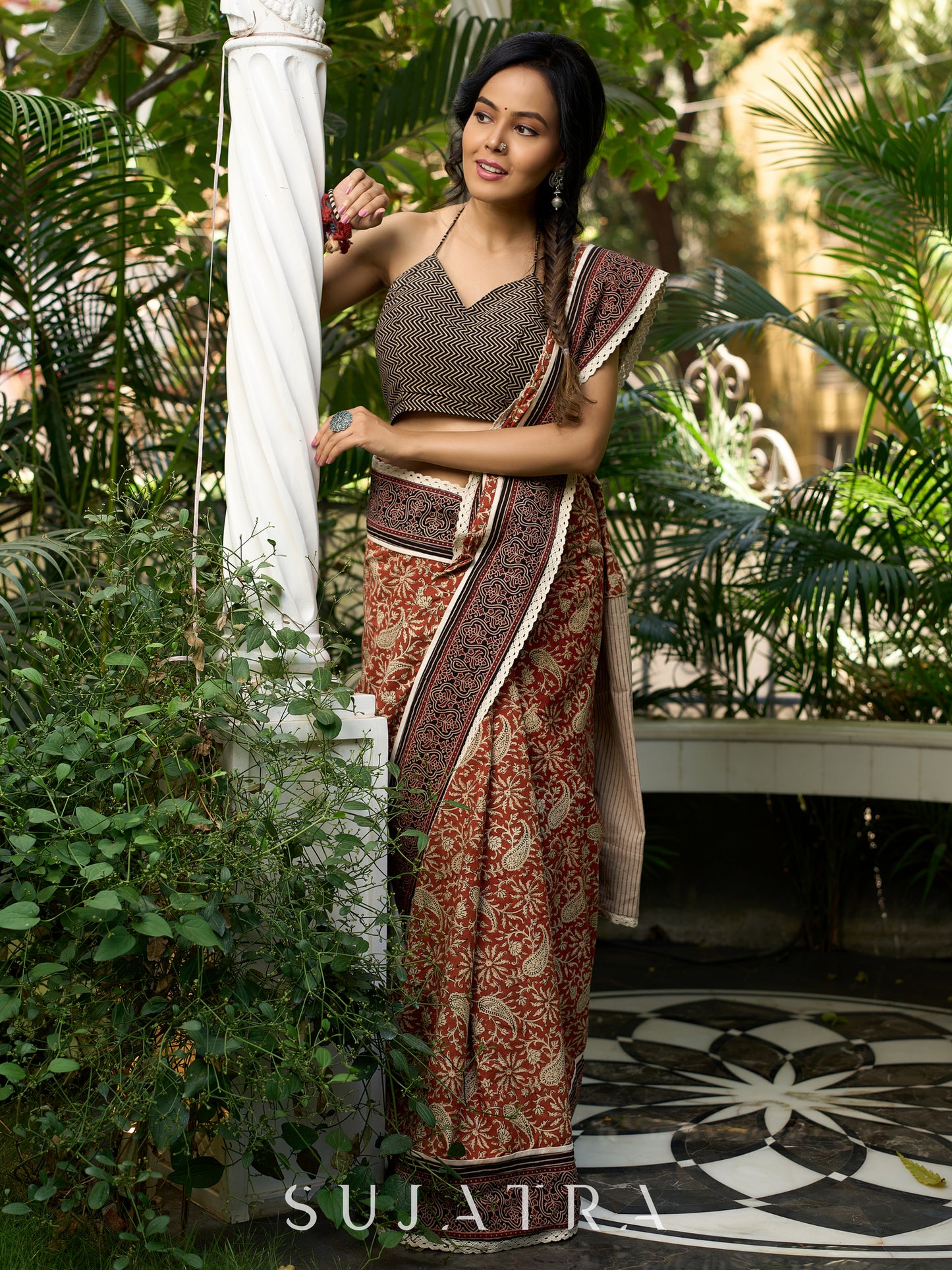 Earthy block-printed cotton saree with paisley charm and rustic elegance