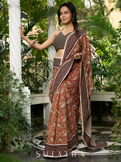 Earthy block-printed cotton saree with paisley charm and rustic elegance