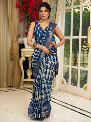 Exclusive linen mix saree in indigo hues with bold abstract block prints