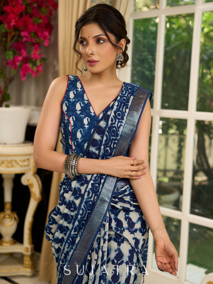 Exclusive linen mix saree in indigo hues with bold abstract block prints
