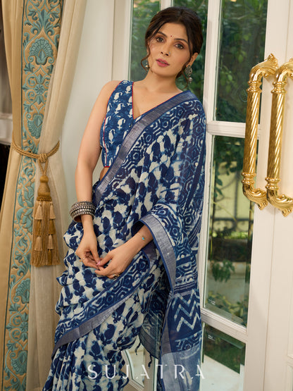 Exclusive linen mix saree in indigo hues with bold abstract block prints