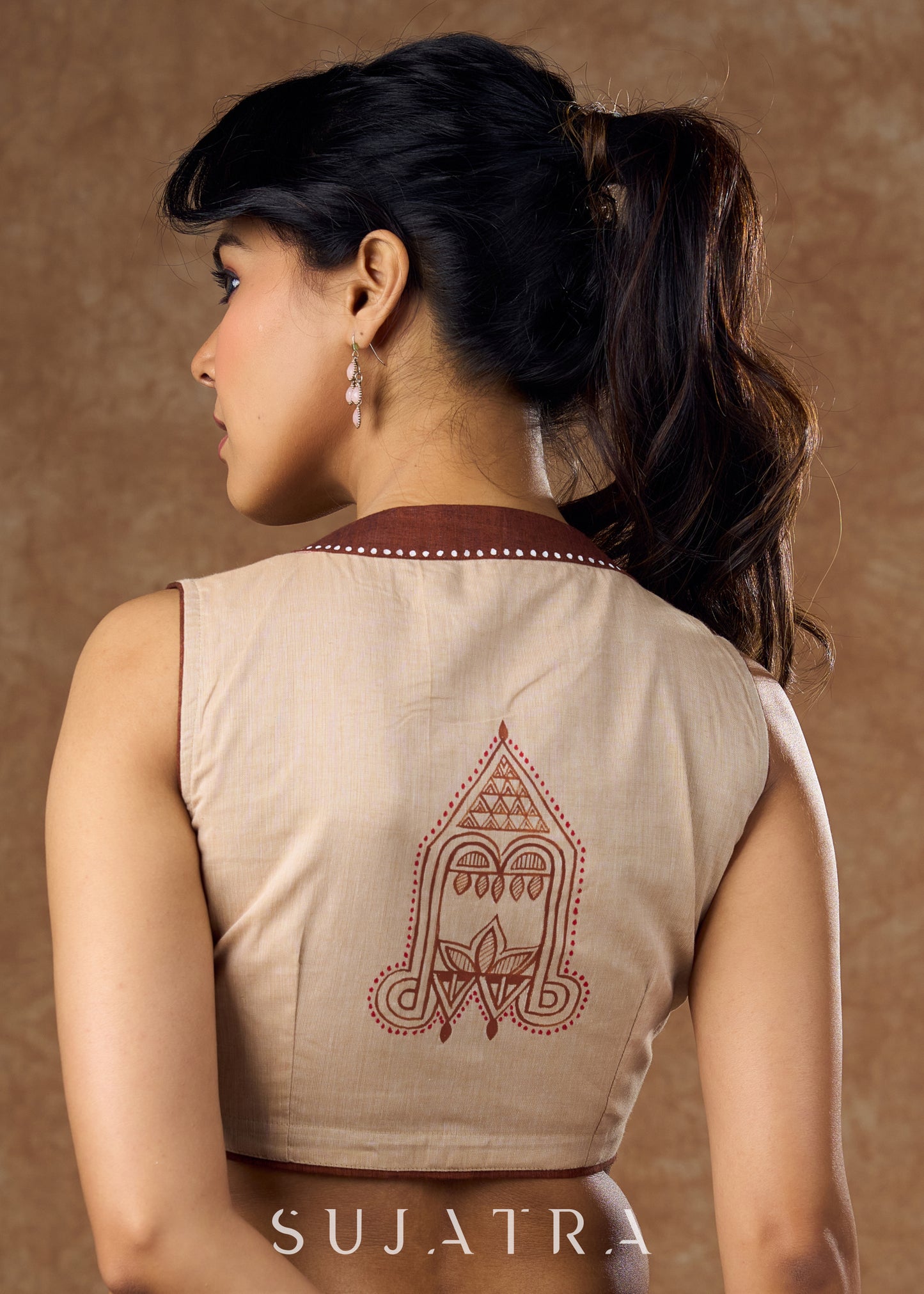 Elegant handloom cotton blouse featuring intricate hand-painted artwork and subtle brown detailing