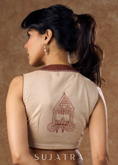 Elegant handloom cotton blouse featuring intricate hand-painted artwork and subtle brown detailing